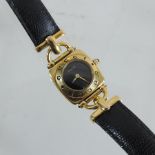 A Gucci ladies gold plated wristwatch, 6300L,