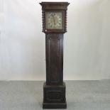An early 20th century oak cased longcase clock, with Westminster chimes,