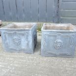 A pair of lead planters,