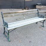A green painted metal and slatted wooden garden bench,