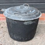 A copper copper, with a cast iron lid,