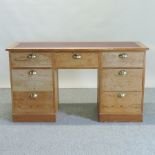An antique pine twin pedestal desk,