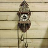 A reproduction wall clock,