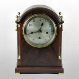 A 19th century mahogany cased bracket clock, the silvered dial showing Arabic hours,