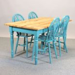 A pine and blue painted dining table, 140 x 85cm,