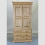 A pine double wardrobe,