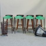 A set of four black upholstered stools, together with a set of metal framed stools,