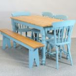 A pine kitchen table with painted legs, 148 x 75cm,