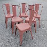 A set of six metal dining chairs