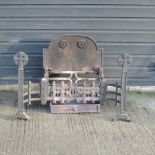 A cast iron fire basket and fire back,