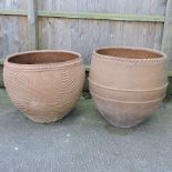 A large terracotta garden pot, 85cm diameter,