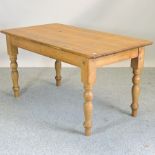 An antique pine kitchen table,