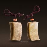 TWO CHINESE WHITE AND RUSSET JADE SCROLLS PENDANTS