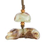 A GROUP OF CHINESE YELLOW JADE PENDANTS (RABBIT AND DOG)