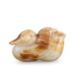 A CHINESE WHITE AND RUSSET JADE DUCK