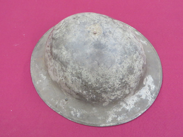 WW1 American Pattern Brodie Steel Helmet khaki painted exterior low crown helmet. Turned edge