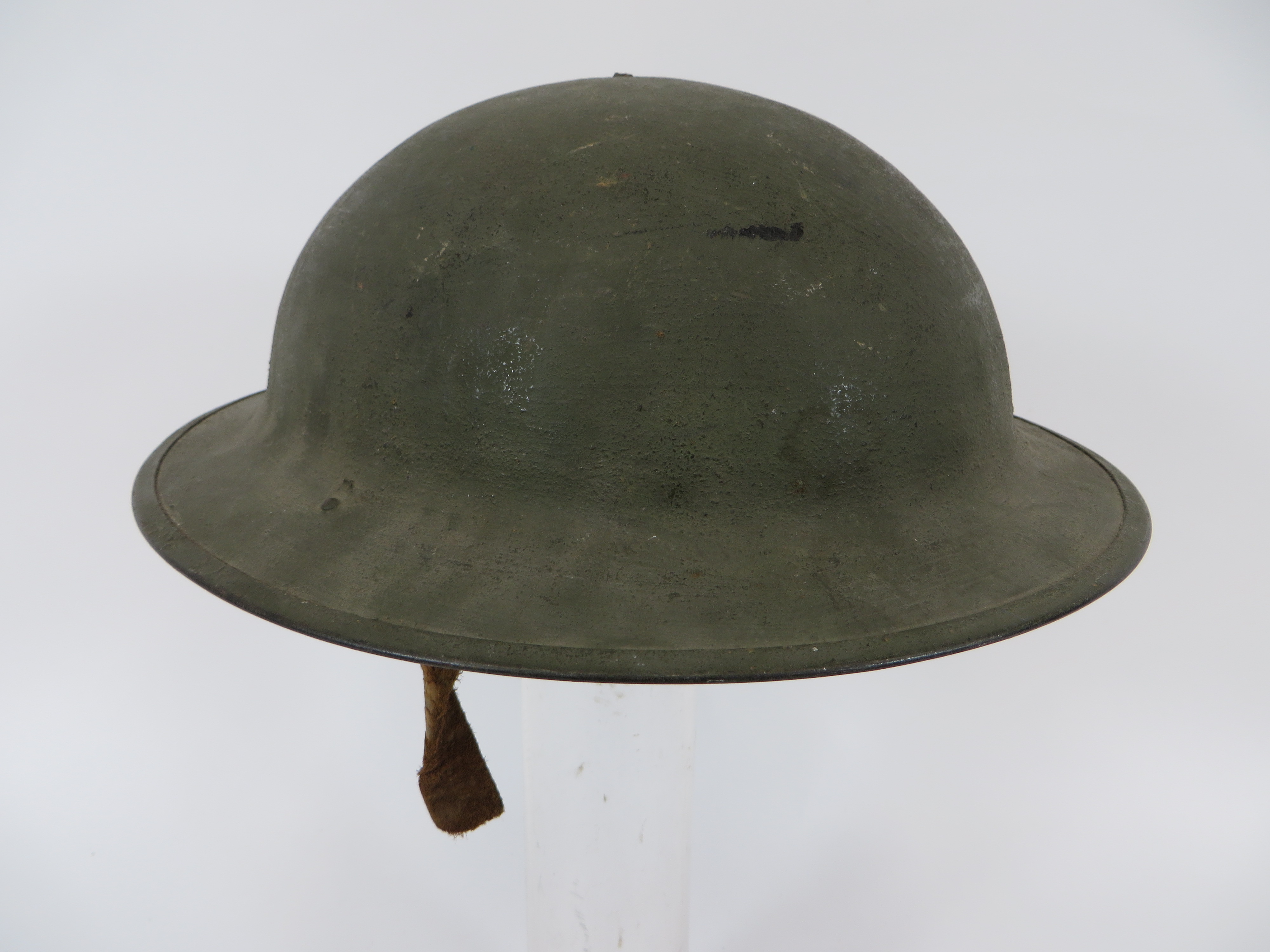 WW1 American Pattern Brodie Steel Helmet green painted exterior low crown helmet. Turned edge