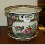 A Cantonese style jardinière, ovoid form with everted rim and stylised panel decoration, with