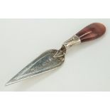 An Edwardian silver trowel form bookmark, William Henry Leather, Birmingham 1907, agate handle, 2½