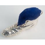 An Edwardian silver novelty boot pin cushion, Samuel M Levi, Chester 1910, modelled as an untied old