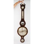 A Regency mahogany wheel barometer, swan neck pediment with ivory finial, hygrometer and thermometer