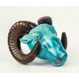 A 20th century carved turquoise and smoked agate ram's head, with inset eyes, probably Indian, 3½in.