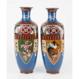 A pair of Japanese cloisonné vases, of square ovoid form with narrow neck and flared rim, polychrome