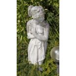 A composite stone classical maiden figure, 51in. (129.5cm.) high.