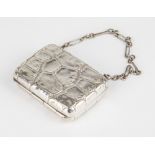 A Victorian silver ring purse, F&W, Birmingham 1886, rectangular form, embossed crocodile skin