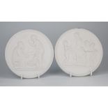 Two Copenhagen plaques, biscuit porcelain, circular in form with raised classical scenes,