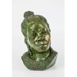 An African green verdite Shona woman bust, carved with braided hair collected at the top and flowing