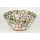 A large 19th century Cantonese famille rose bowl, with alternating panels of stylised figural,