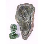 An African carved green verdite plaque and bust, the plaque depicting a tribal bow hunter in