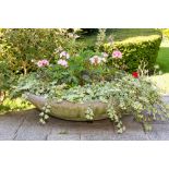 A composite stoneware shallow planter, of dish form, planted with dwarf ivy and geraniums, 41d x 10h