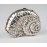 A Victorian novelty silver snail shell form snuff box, Chester 1885, with embossed leaves, twin