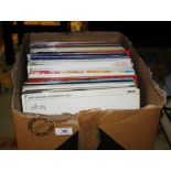 An assorted lot of records - musicals, L.Ps, singles etc.