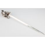 A Scottish basket-hilted sword form novelty silver letter opener, Henry Tatton, Edinburgh 1912, with