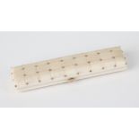 An ivory toothpick case, late 19th century, rectangular form rounded upper section decorated with