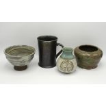 Four pieces of studio pottery, to include a mid-20th century footed bowl by Alex Sharp, marbled