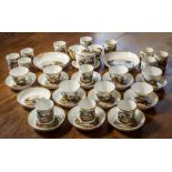 An early 19th century Continental porcelain topographical part tea and coffee service, possibly