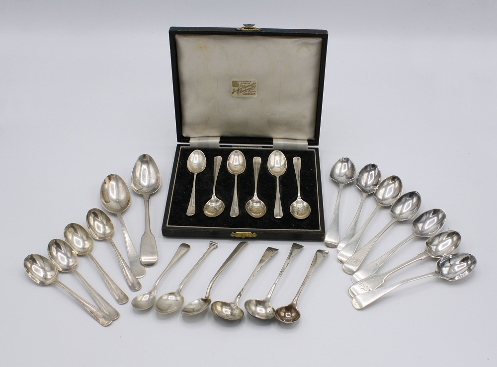 An assorted lot of silver spoons, to include a cased set of six by Barker Brothers Silver Ltd.,