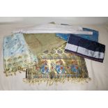 Four Indian shawls, mid-20th century, including two in silk with decoration of elephants and other