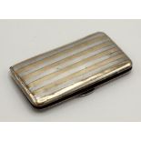 A George V gold and silver card case by Sampson & Mordan, London 1913, rectangular with alternating