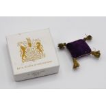 Royal Coronation interest, an emery needle cleaner made from the purple silk velvet used for the