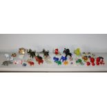 A collection of miniature glass elephants, in coloured and clear glass, approx. 29 in total, plus