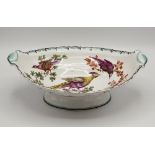 A first period Worcester footed boat shaped dish, early 19th century, decorated with pheasants and