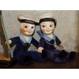 A pair of Norah Wellings cloth sailor dolls, with painted features and blue velvet sailors