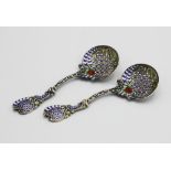 A pair of Continental silver and enamel sifter spoons, import marks for Birmingham 1884, the