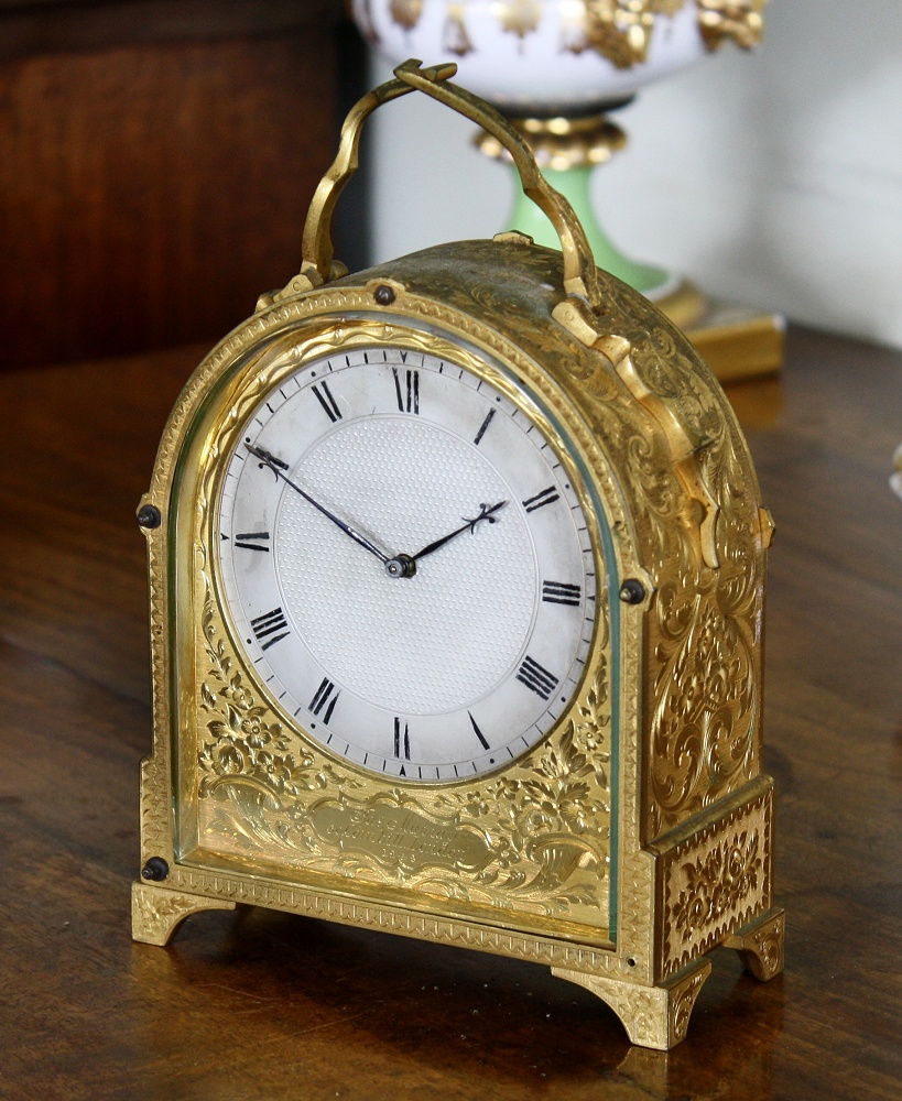 A fine and rare early Victorian engraved gilt brass hump-back carriage clock by James Murray of