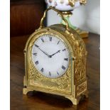 A fine and rare early Victorian engraved gilt brass hump-back carriage clock by James Murray of